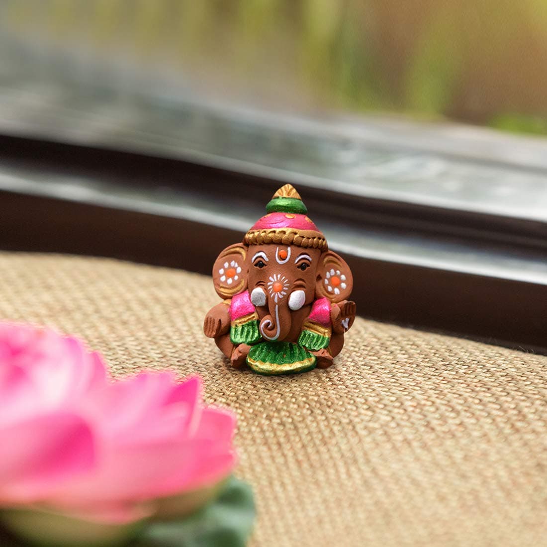 ExclusiveLane Terracotta Earthenware Handpainted Baby Car Ganesha -Idols and Figurines Showpieces Home Decor (EL-014-032, Multicolour, 4.57 cm x 4.57 cm x 4.83 cm)
