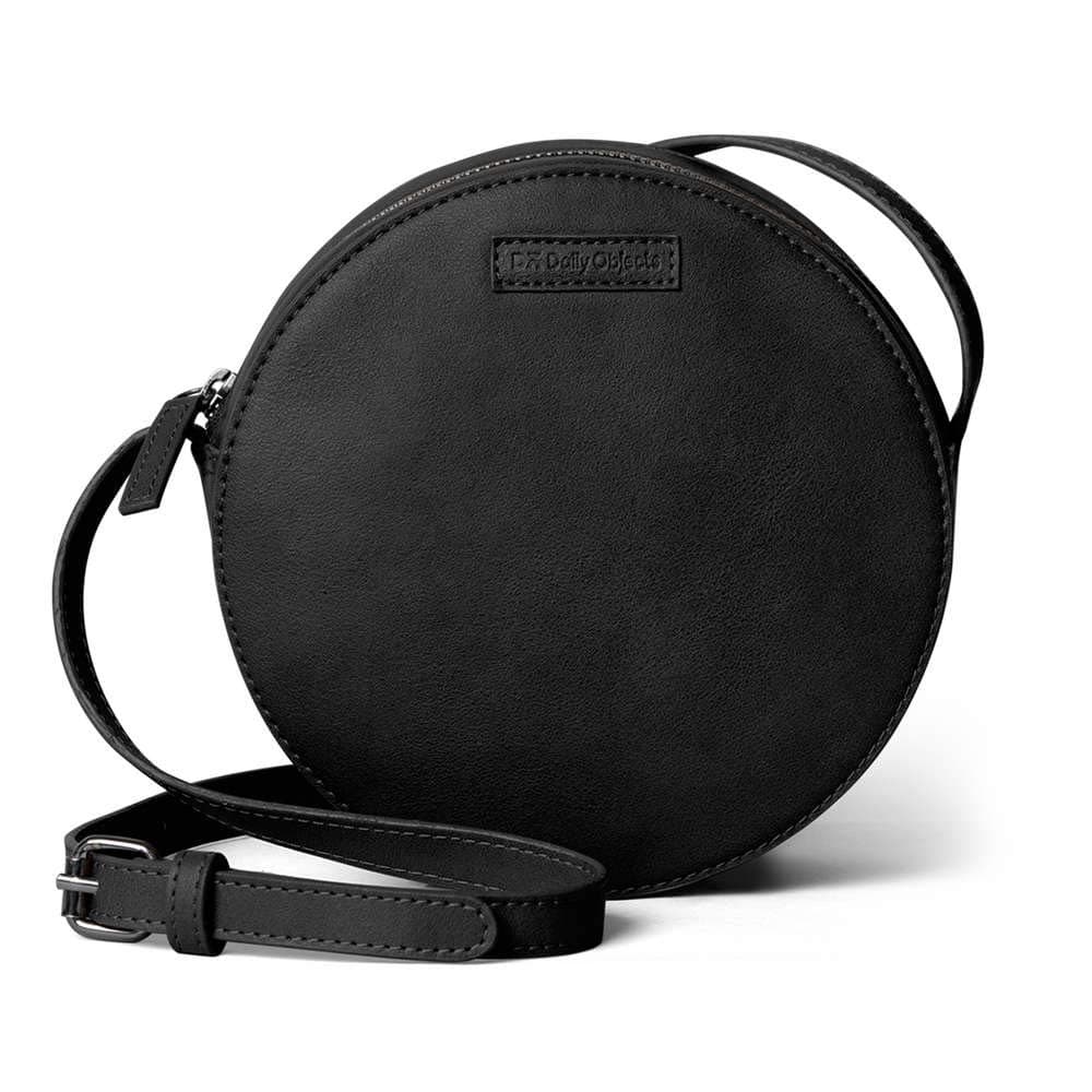 DailyObjects Orbis Round Sling Crossbody Bag For Women| Stylish Solid Black Faux Leather Purse With Slip Pocket & 2 Compartments Inside| Zip Closure & Adjustable Strap| Storage Space For Essentials