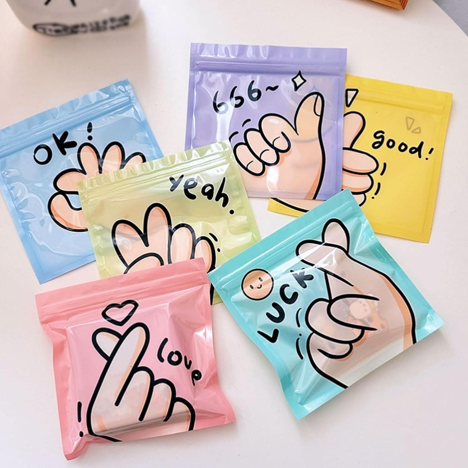SATYAM KRAFT 36 Pcs Korean Style Ziplock Pouches for Gifting, Birthday Return Gift Packing, Gifts, Snacks, Dry Fruits, Small Items | PVC Bags with Hand Sign Prints – Multicolor (Random)