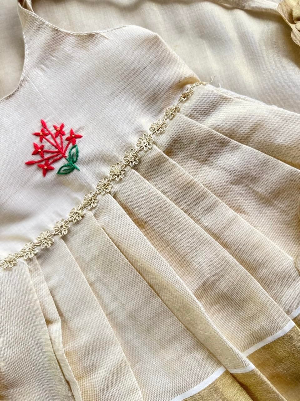 Picksparrow Newborn Baby Girl Ethnic Dress/Traditional Frock with Head Band (Kerala Kasavu, Hand- Embroidered)