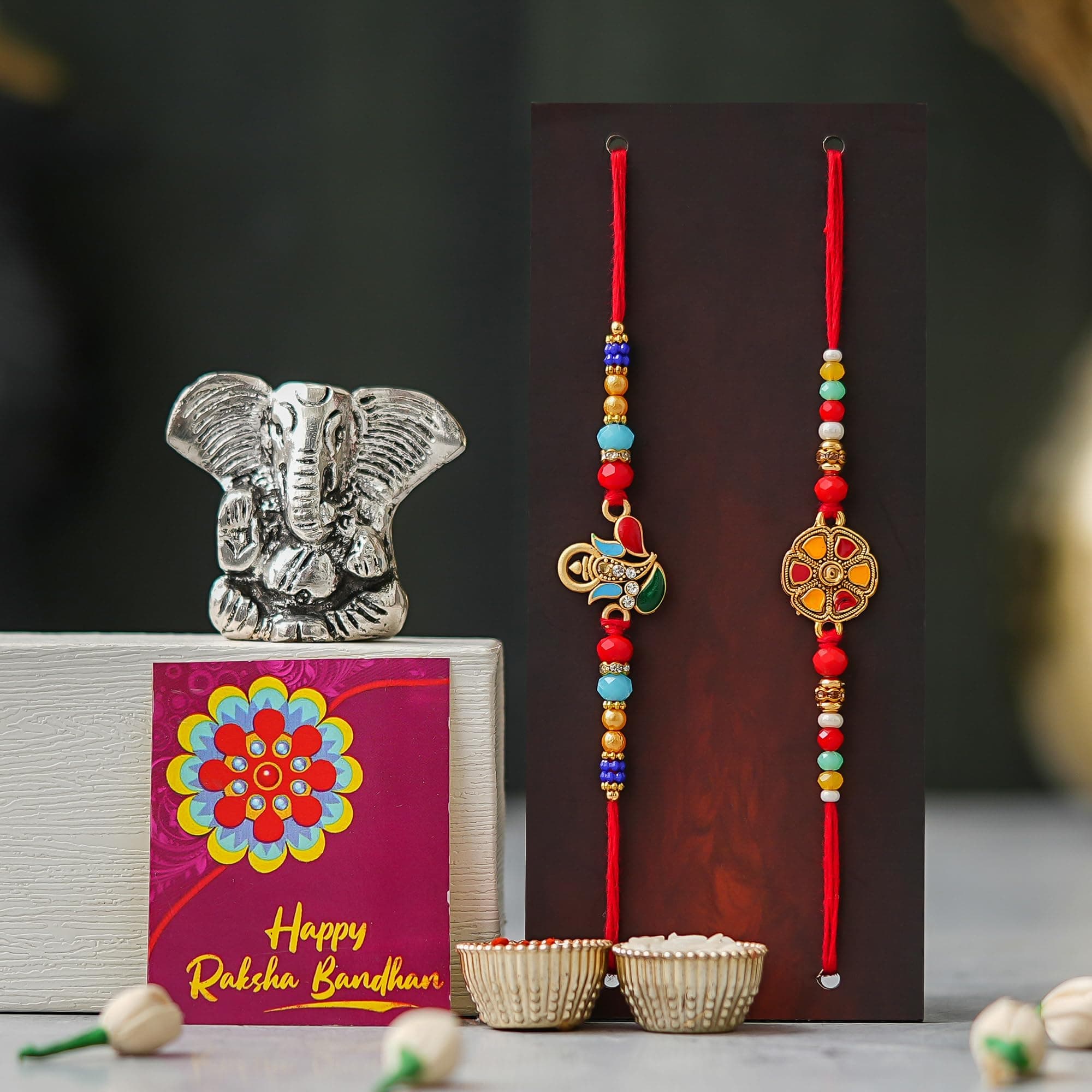 TONKWALAS Rakhi for Brother with Ganesh Idol Combo Set | Combo of 5 (1 Ganesh Idol, 2 Rakhi, 1 Roli Chawal Pack, 1 Greeting Card) | Rakhi Gift for Brother